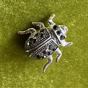 Silver Tone Scarab Brooch with Black Rhinestones